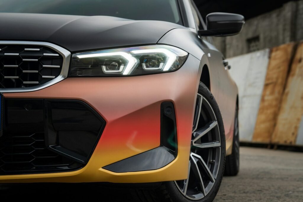 Close up of the front of a wrapped car.